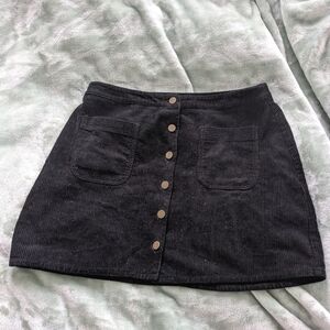 Simon's Twik Women's black Corduroy mini skirt with pockets - Size US L